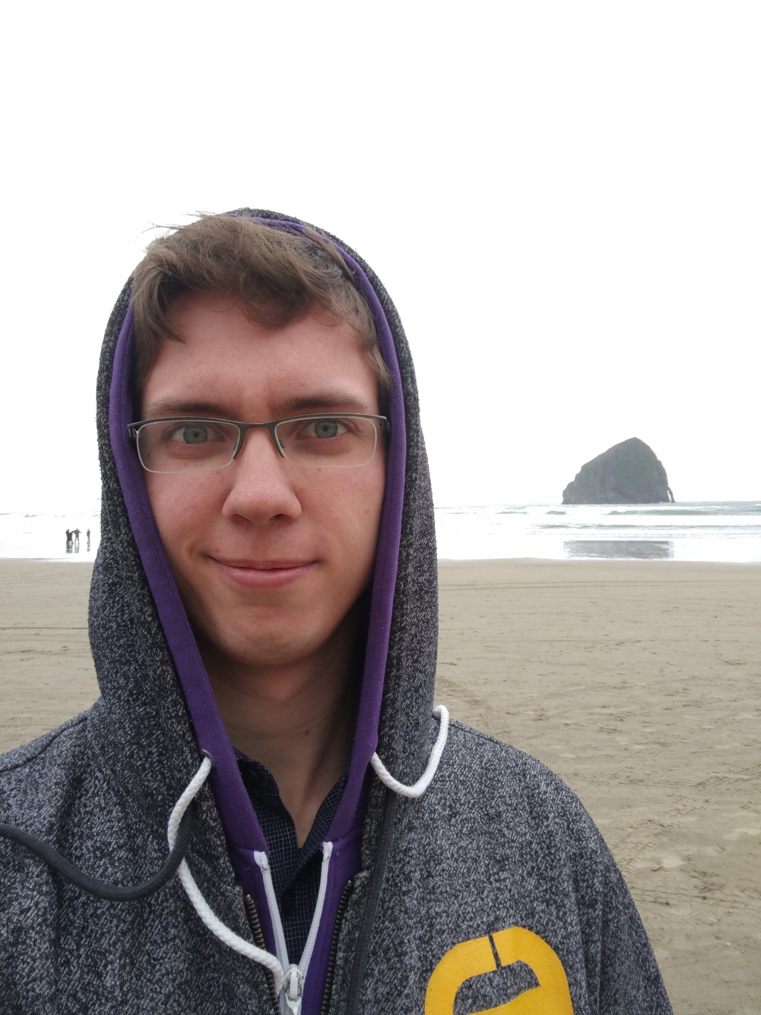 Samuel Young at the haystack rock in Pacific City, OR